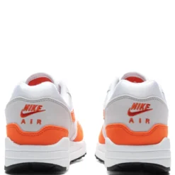 Nike Women's Air Max 1 '87 'Safety Orange' - Neutral Grey/Safety Orange/White -Urban Fashion Sales Nike Air Max 1 87 Women s Neutral Grey Safety Orange White DZ2628 002 10 08 23 Feature KN 6