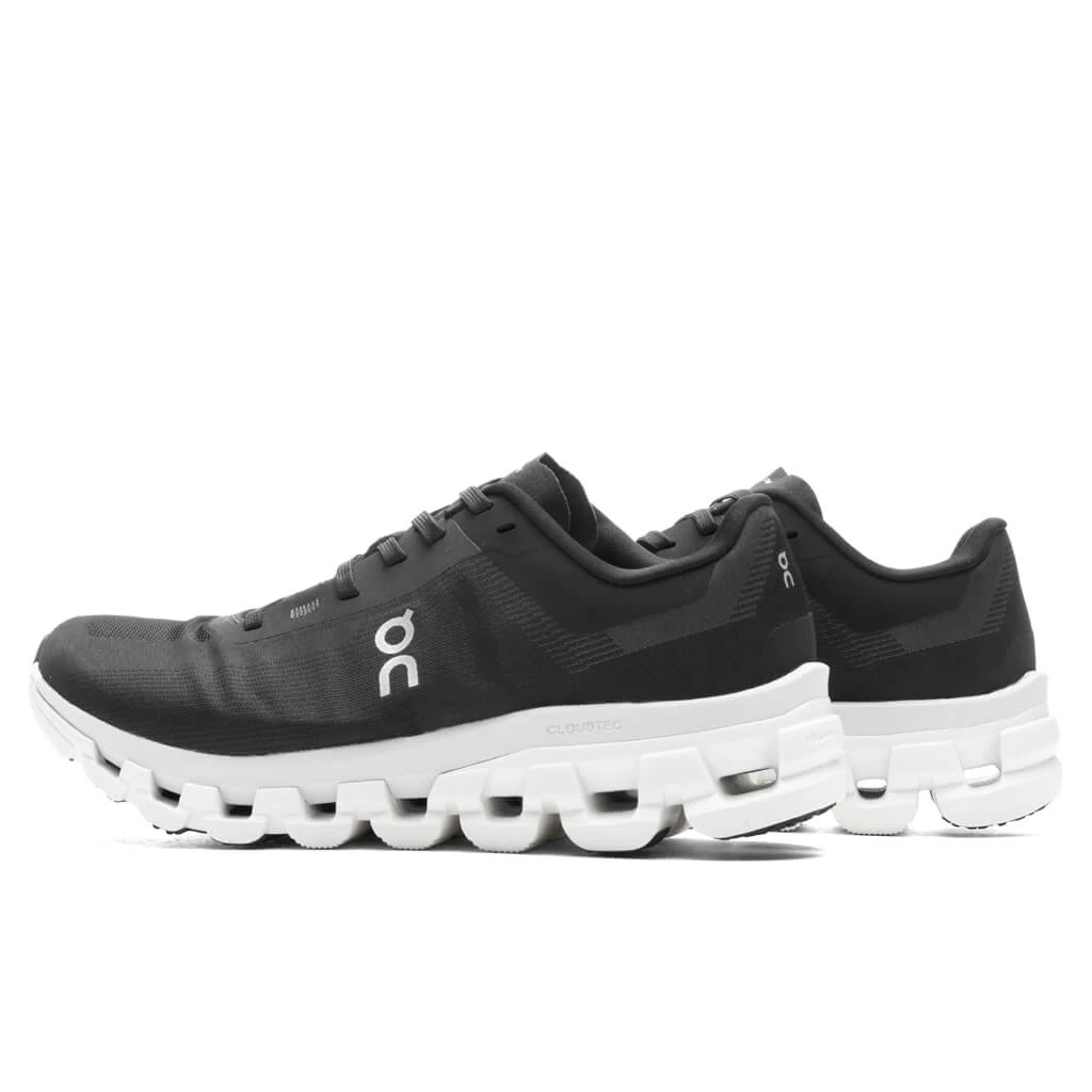 On Women's Cloudflow 4 - Black/White 3 On Women's Cloudflow 4 - Black/White - Image 3
