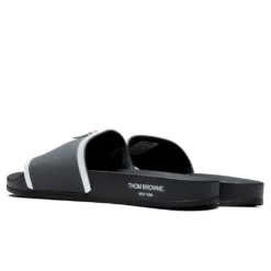 Rubber Pool Slide - Dark Grey 7 Rubber Pool Slide - Dark Grey -Urban Fashion Sales Thom Browne Rubber Pool Slide Dark Grey MFL054A 05690 025 08 30 22 Feature JORDAN 3
